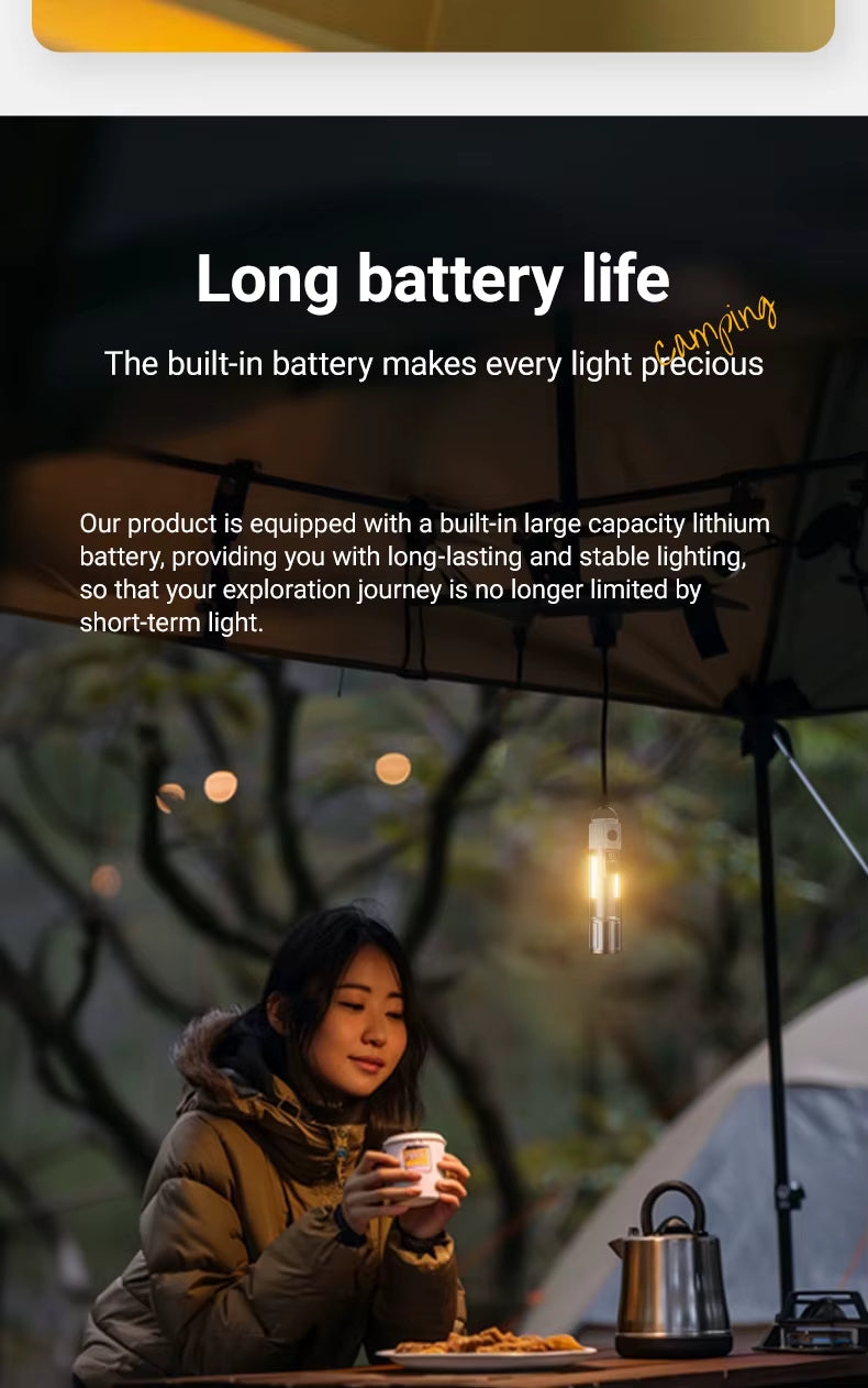 Person sitting at a table with a lighted area, possibly a camping scene, with text about long battery life.
