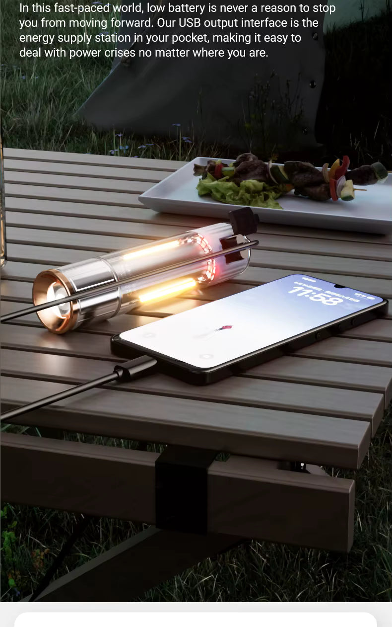 USB power bank charging a smartphone on a wooden table outdoors